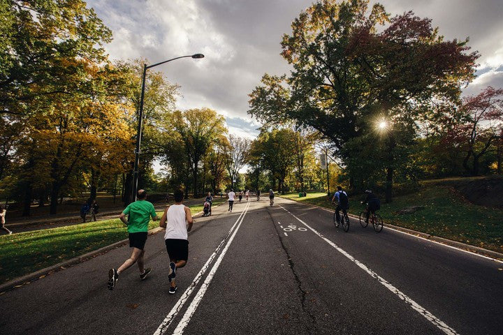 People running outside on street